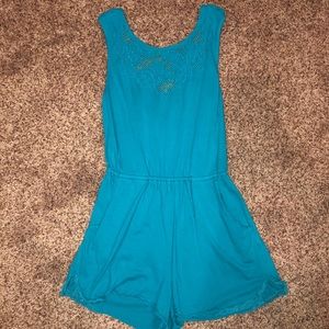 Teal romper with an open back